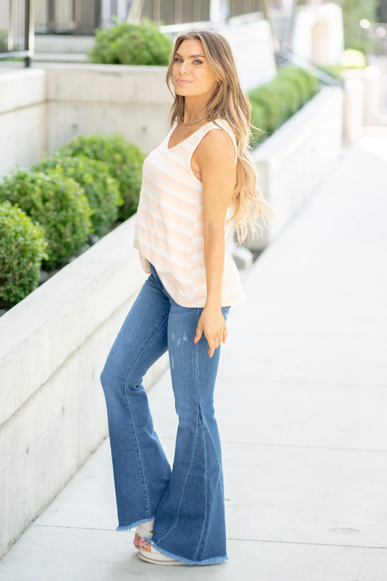 Cleo Mid Rise Twisted Inseam Flare Jeans