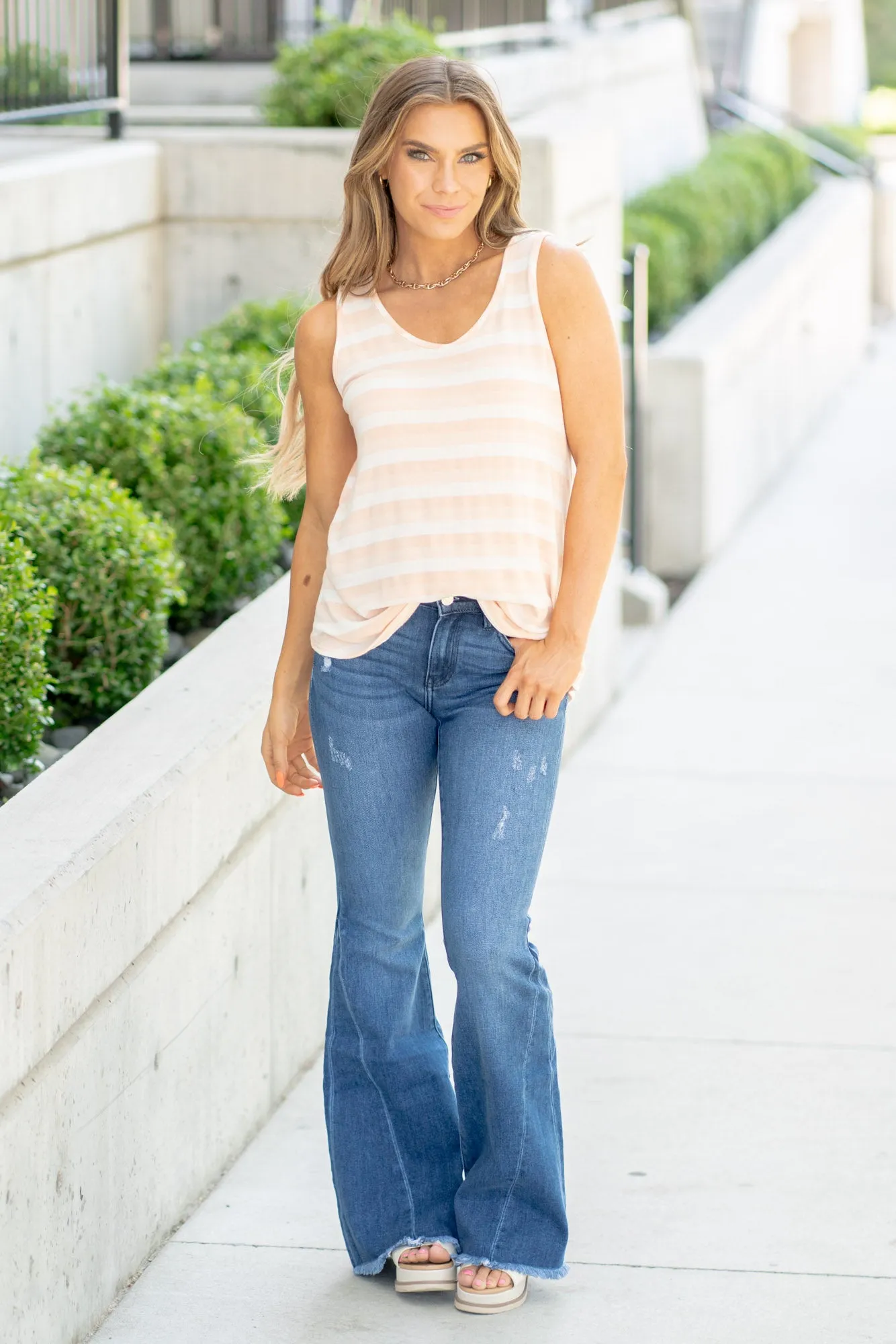 Cleo Mid Rise Twisted Inseam Flare Jeans