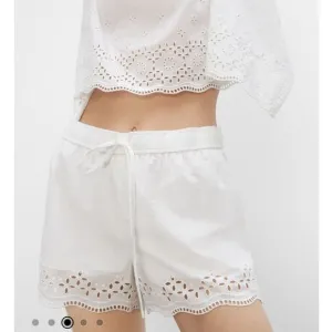 Club Monaco Embroidered Eyelet Cotton Drawstring Shorts in white Size 12 NWT