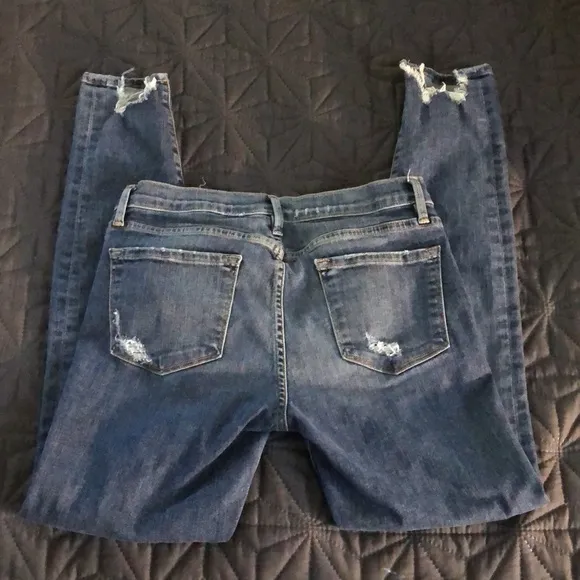FRAME le skinny de Jeanne chew hem jeans