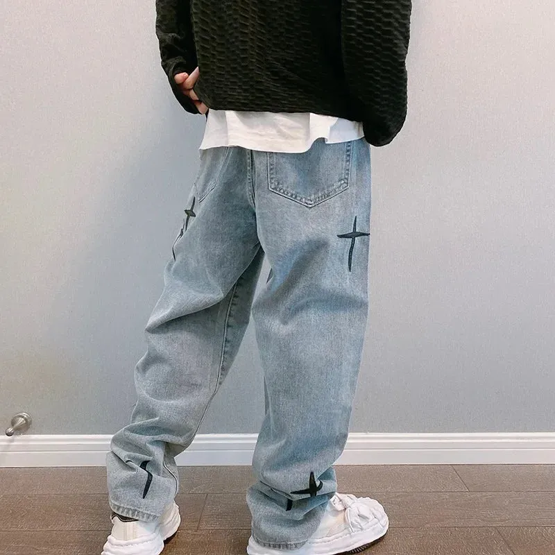 Graphic Washed Denim Blue Jeans with Star/Cross Design - Loose Fit Wide Leg