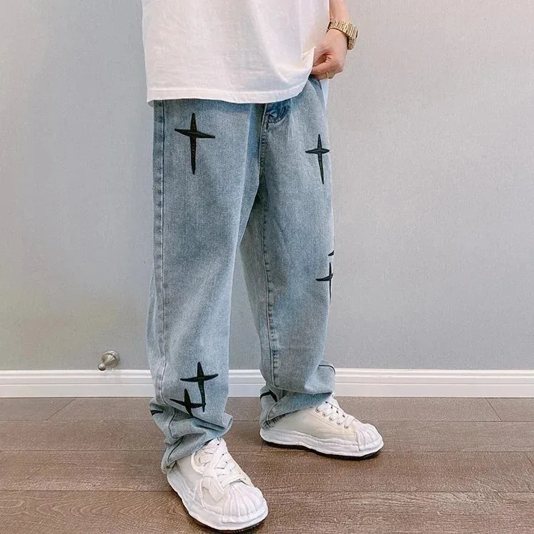 Graphic Washed Denim Blue Jeans with Star/Cross Design - Loose Fit Wide Leg