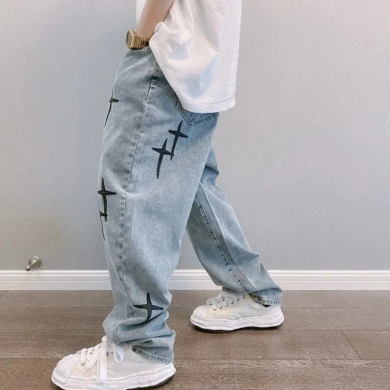 Graphic Washed Denim Blue Jeans with Star/Cross Design - Loose Fit Wide Leg