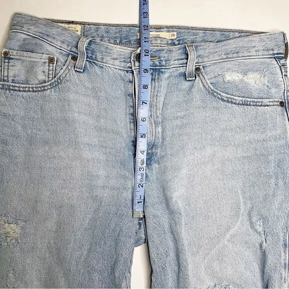 Levis women Baggy Dad Jeans Bin Day 29x30 vtg 90s light wash distressed hole