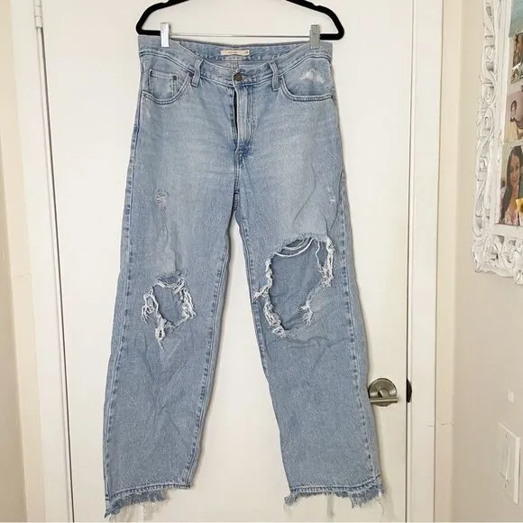 Levis women Baggy Dad Jeans Bin Day 29x30 vtg 90s light wash distressed hole