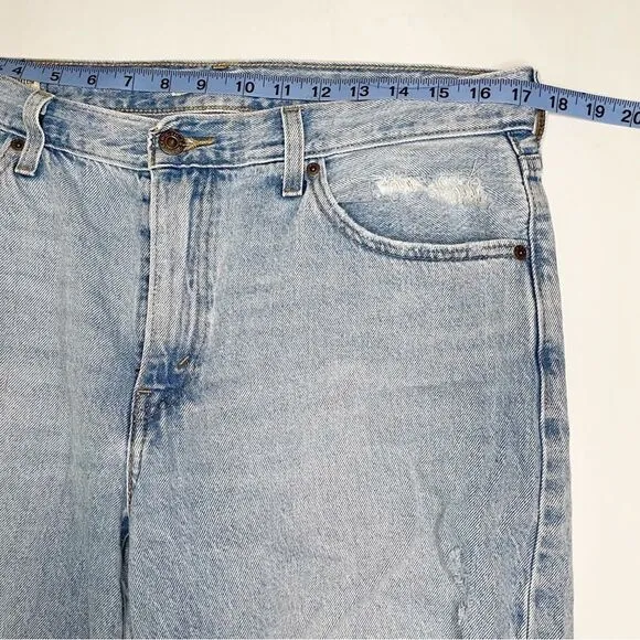 Levis women Baggy Dad Jeans Bin Day 29x30 vtg 90s light wash distressed hole