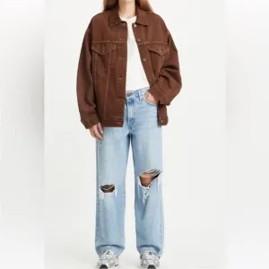 Levis women Baggy Dad Jeans Bin Day 29x30 vtg 90s light wash distressed hole