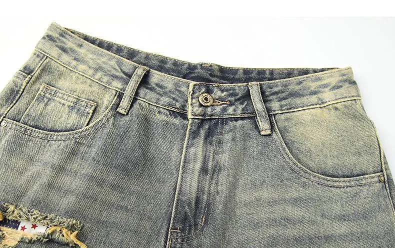 Men's Frayed and Patched Washed Cotton Jeans for a Retro Look