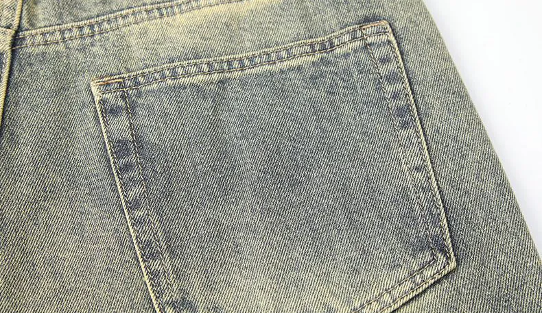 Men's Frayed and Patched Washed Cotton Jeans for a Retro Look