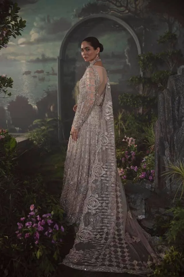 Pakistani Bridal Lehenga Designs in Embellished Heavy Hand Needle Work for Bridal Wear in White Lehenga with Long Gown #BN946