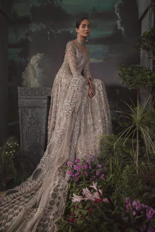 Pakistani Bridal Lehenga Designs in Embellished Heavy Hand Needle Work for Bridal Wear in White Lehenga with Long Gown #BN946