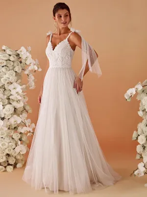 Robe de mariée romantique en dentelle et tulle avec épaules nouées