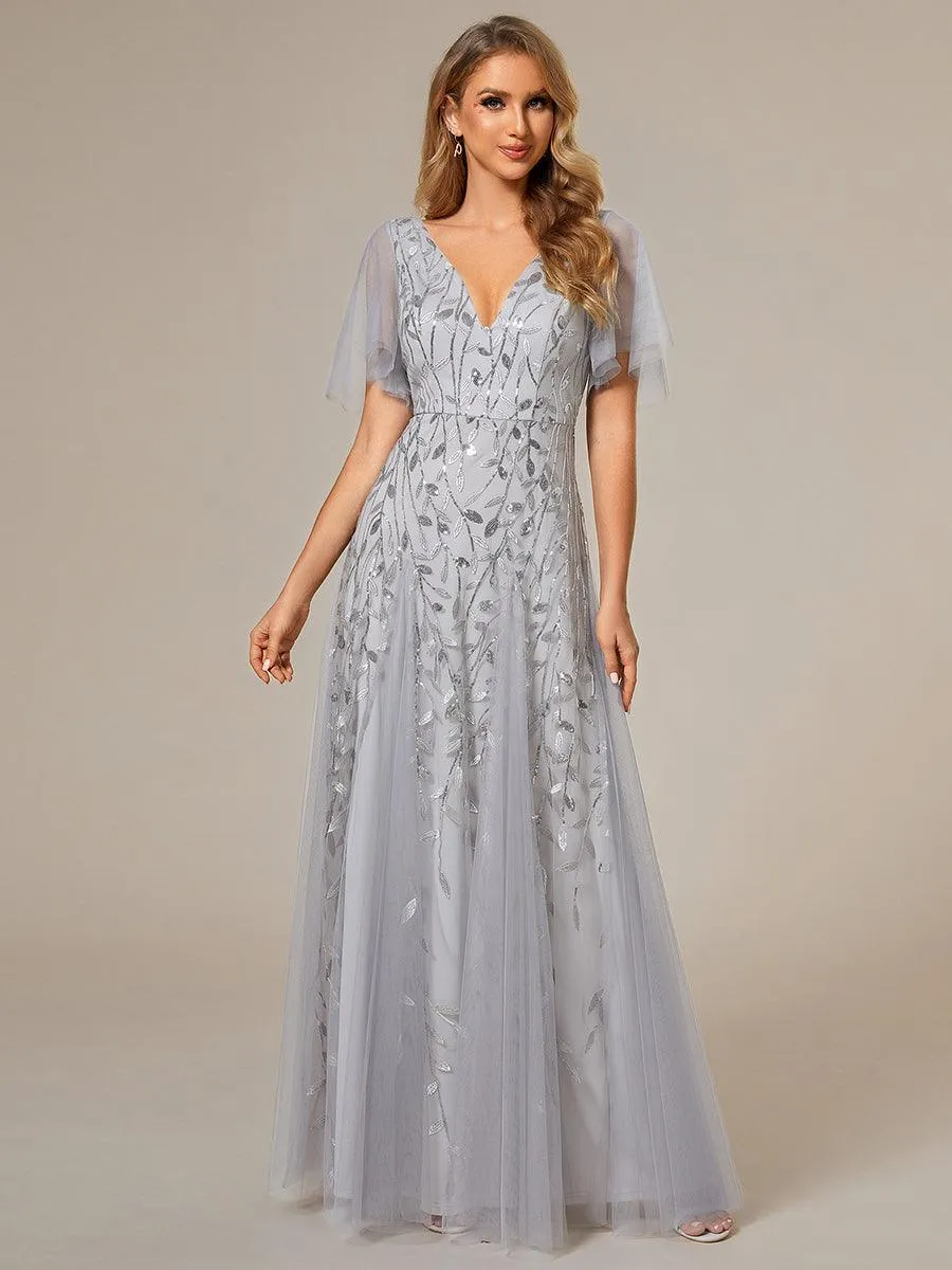 Robe de Soirée Longue Romantique et Scintillante à Col V et Pailletes