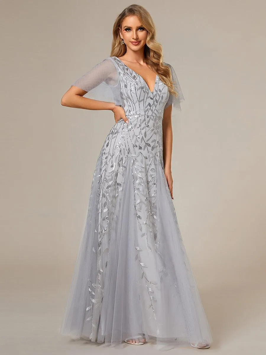 Robe de Soirée Longue Romantique et Scintillante à Col V et Pailletes