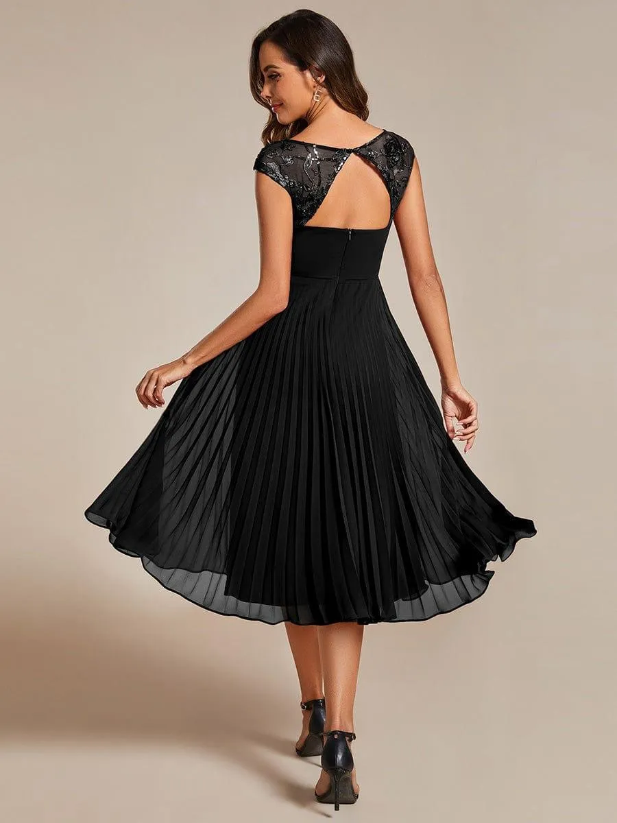 Robe d'invité de mariage trapèze en mousseline de soie à manches courtes avec plis et encolure ronde